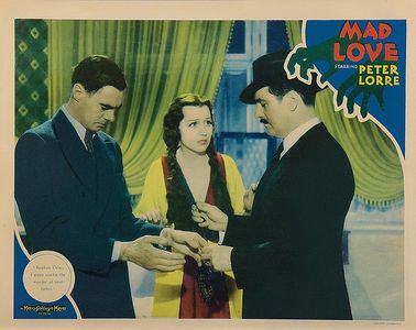 Sam Ash, Colin Clive, and Frances Drake in Mad Love (1935)