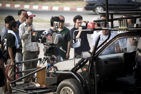 John H. Lee on location in Bangkok shooting 