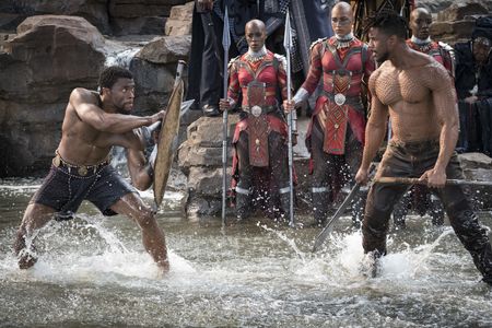 Michael B. Jordan, Chadwick Boseman, Janeshia Adams-Ginyard, Marie Mouroum, and Maria Hippolyte in Black Panther (2018)