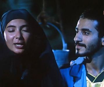 Mona Zaki and Ahmed Helmy in Omar 2000 (2000)