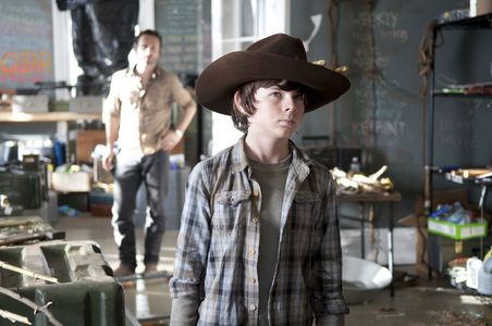 Andrew Lincoln and Chandler Riggs in The Walking Dead (2010)