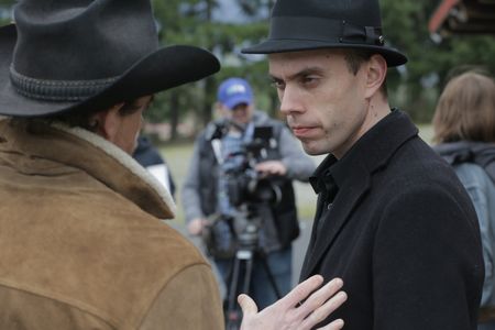 Writer/Director Jeff Ferrell converses with actor Jeffrey Arrington on the set of DEAD WEST.