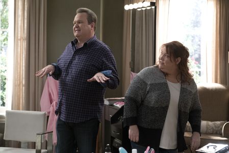 Eric Stonestreet and Dana Powell in Modern Family (2009)