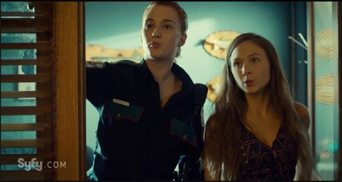 Dominique Provost-Chalkley and Katherine Barrell in Wynonna Earp (2016)