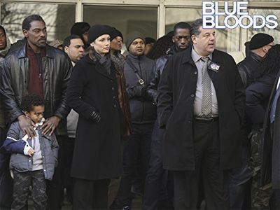 Bridget Moynahan, Cyrus Farmer, Steve Schirripa, and Jaiden J. Smith in Blue Bloods (2010)