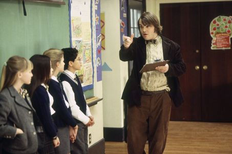 Jack Black, Miranda Cosgrove, Veronica Afflerbach, Jordan-Claire Green, and Z Infante in School of Rock (2003)