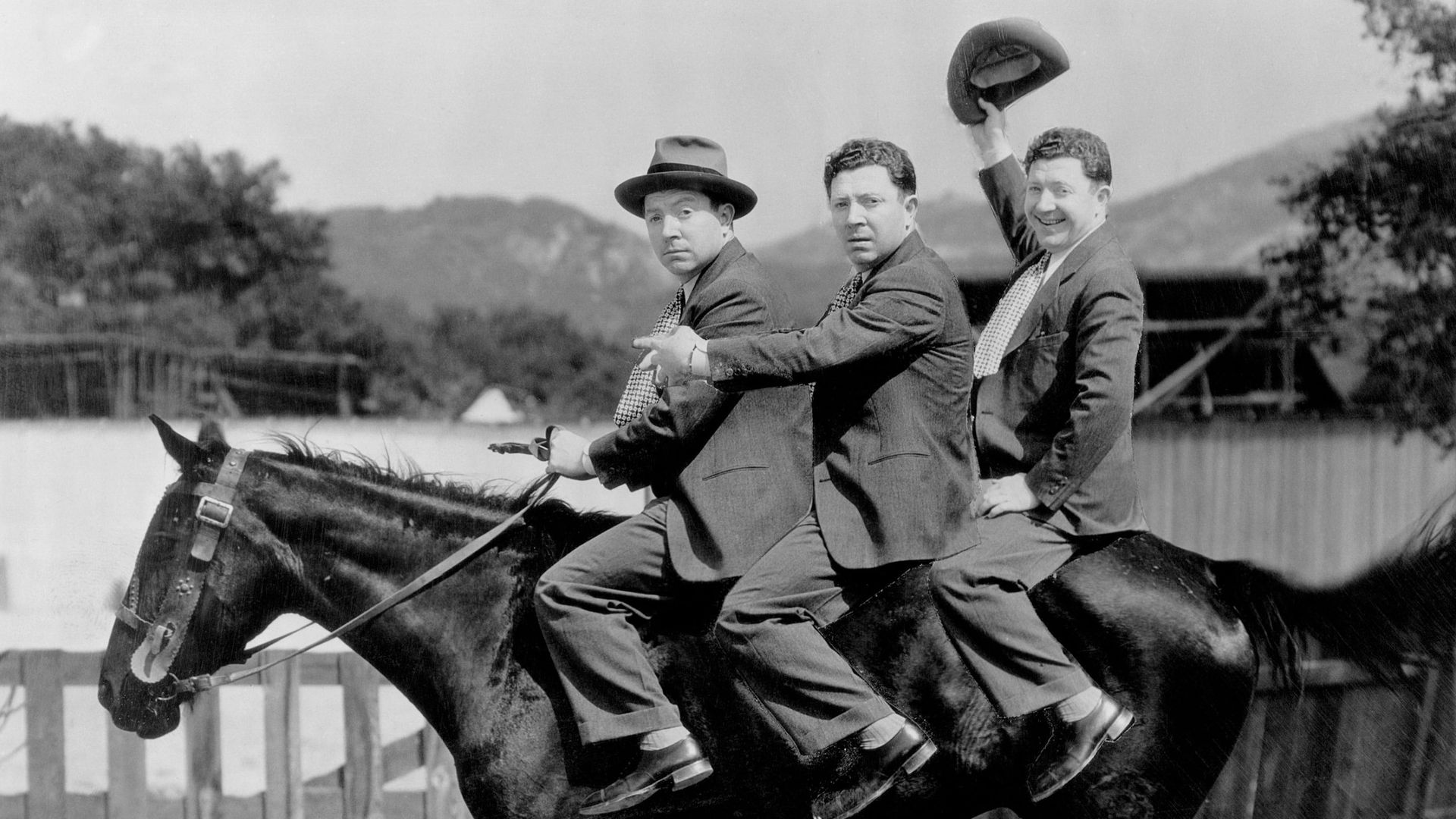 Three Men on a Horse background