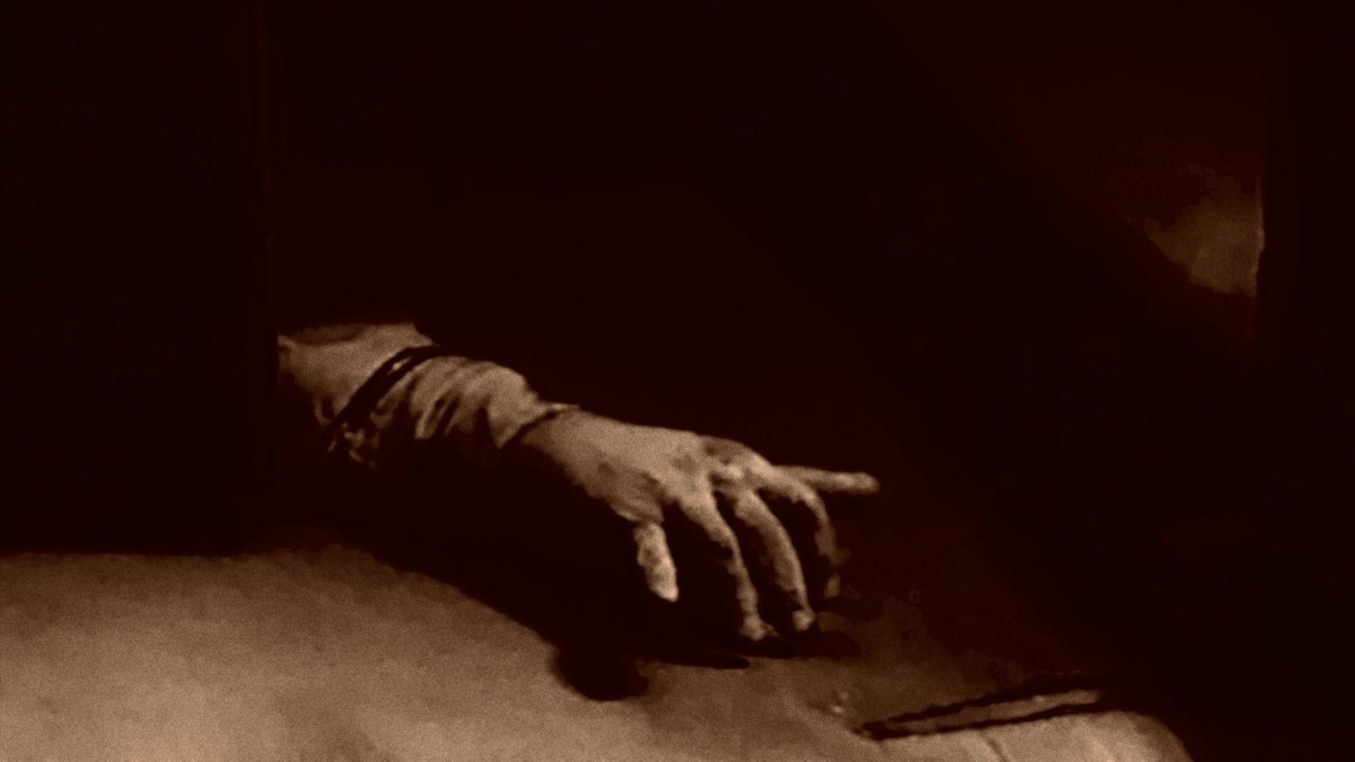 The Crawling Hand background