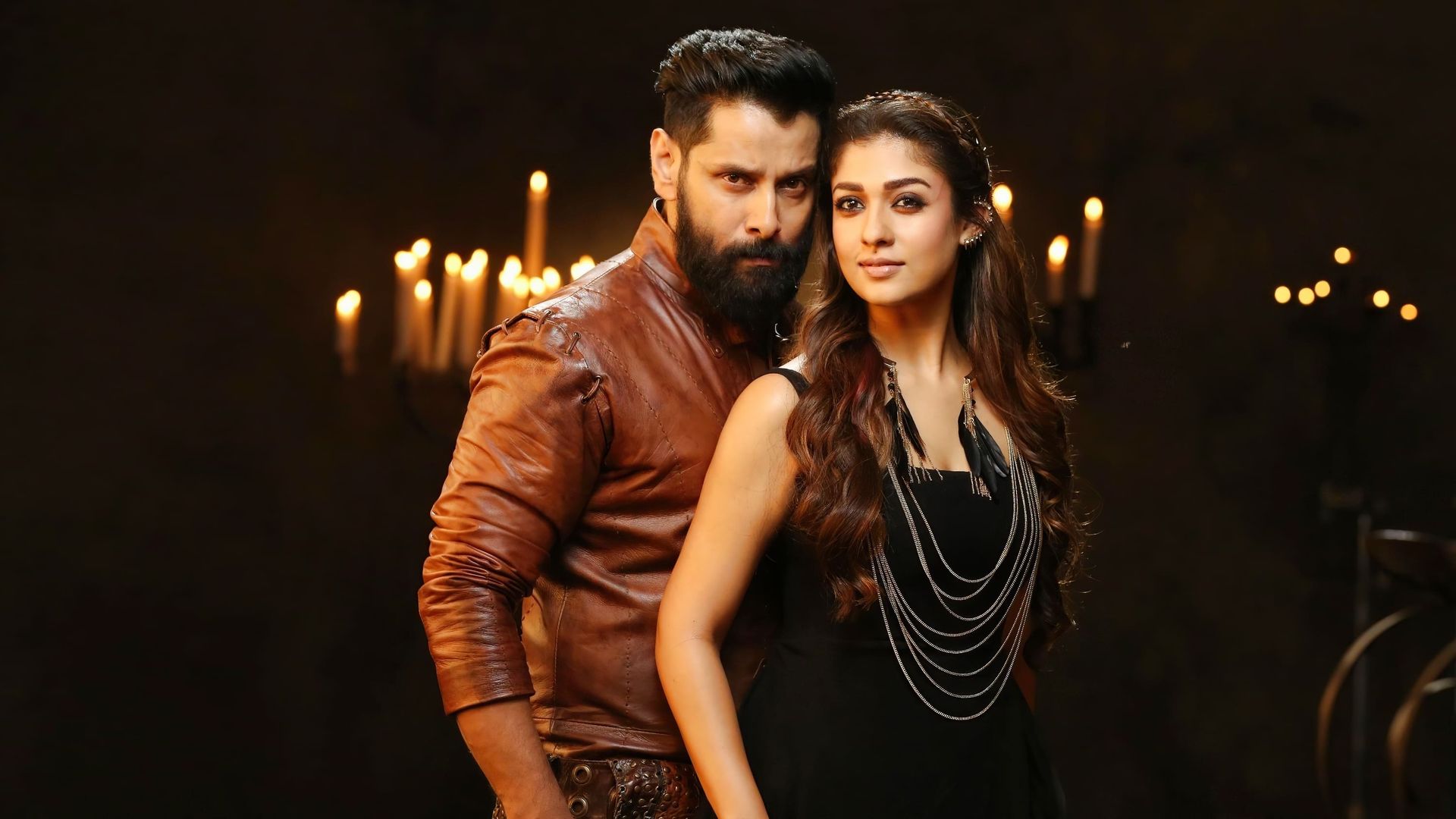 Irumugan background