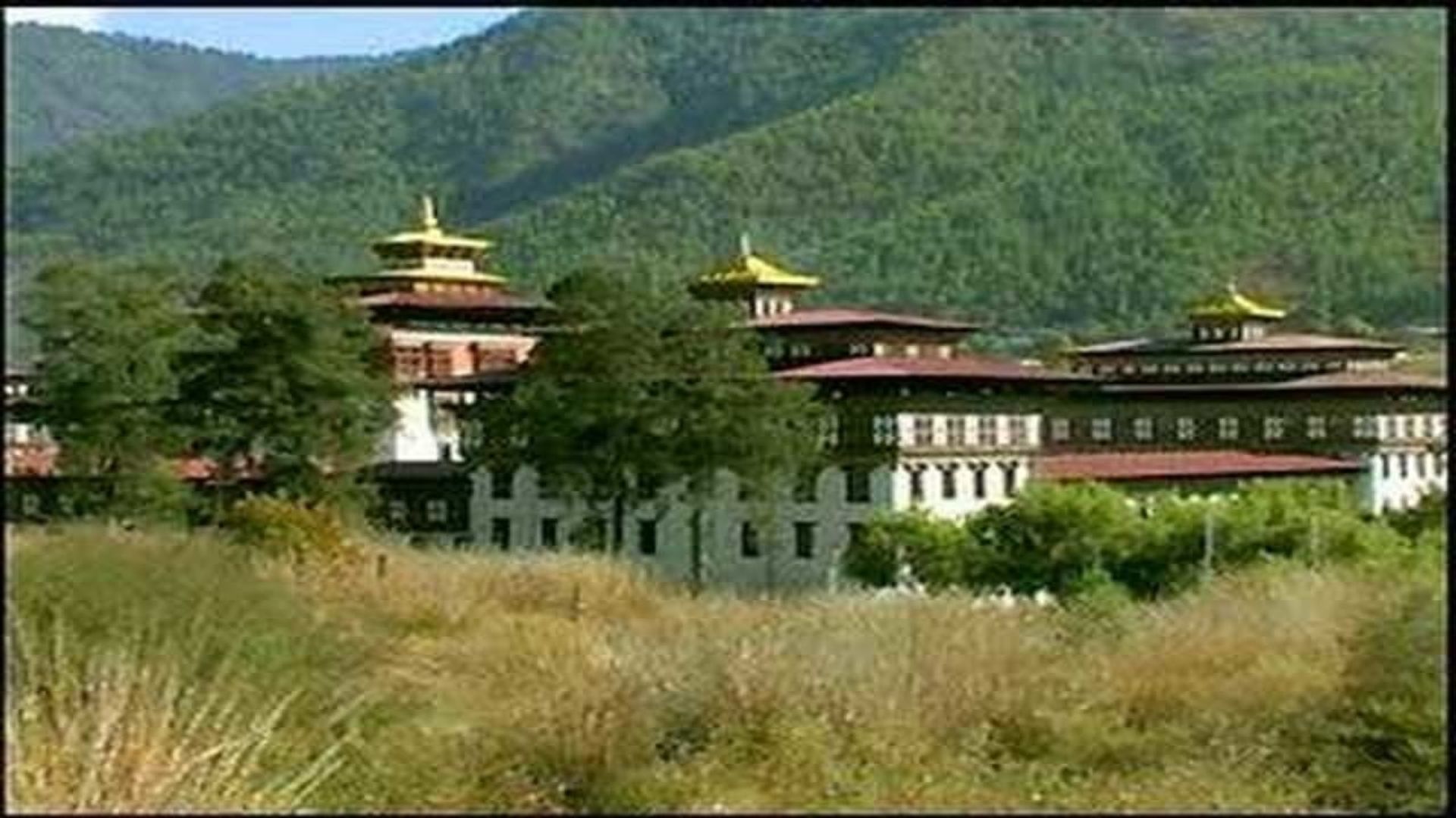 Bhutan: Taking the Middle Path to Happiness background